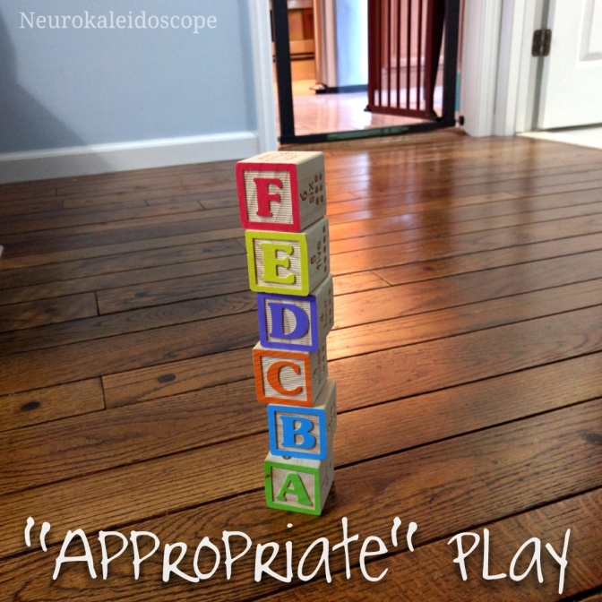 [Image shows a stack of wooden alphabet blocks with the text "Appropriate" Play beneath it.]